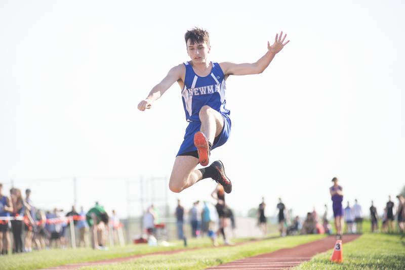 Newman's Liam Schmall competes in the triple jump at the class 1A Erie track sectionals on Thursday, May 19, 2022.