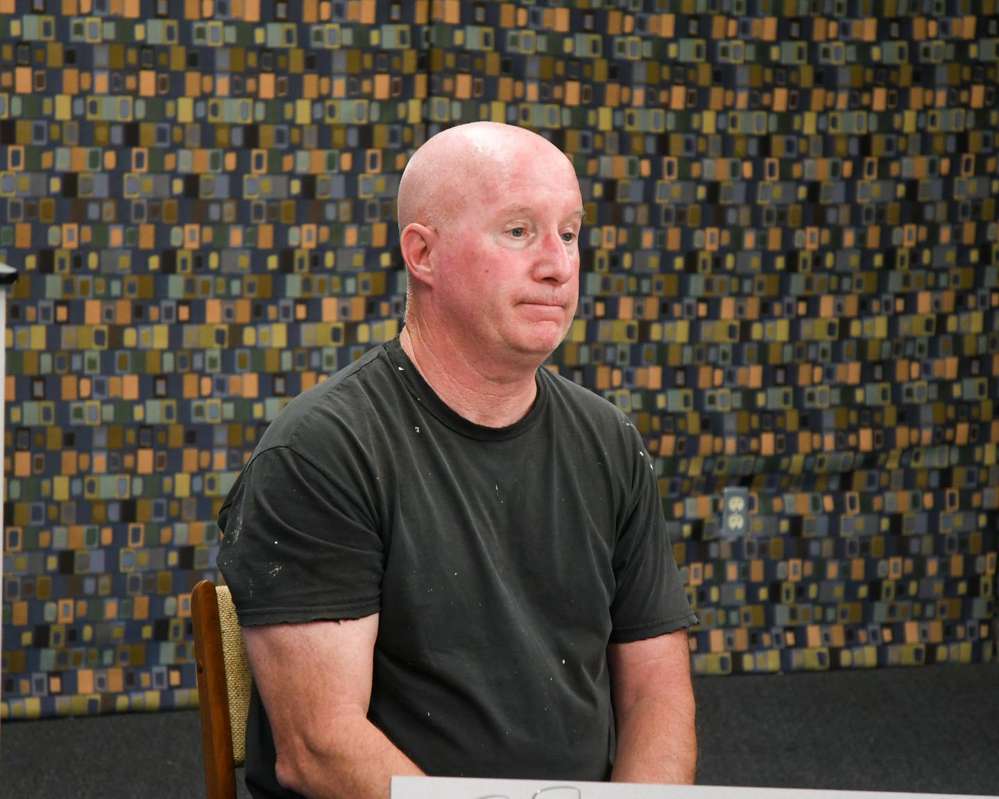 Dan Sears expresses his concerns during an interview on Wednesday July 5, 2023 about the 133 year old building he owns on 2nd street downtown DeKalb and the city wanting to acquire the land for a parking lot.