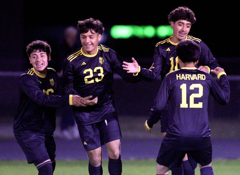 Harvard’s Miguel Mercado, upper right, and the Hornets celebrate after Mercado scored on a far outside shot against Richmond-Burton’s in varsity soccer on Monday, Oct. 7, 2024, at Dan Horne Field on the campus of Harvard High School in Harvard.