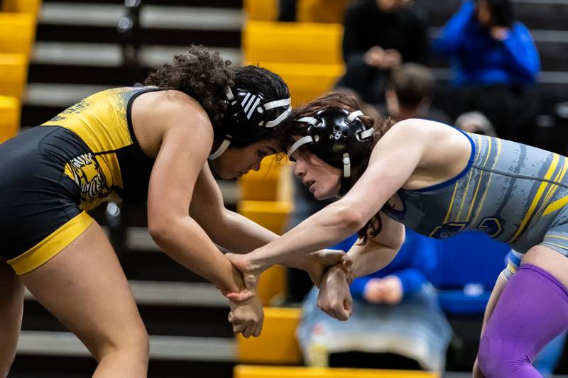 Joliet West’s Kaylah Harris and Joliet Central’s Emma Guethle compete in the 140 pound match at Joliet West on Jan. 12, 2026.