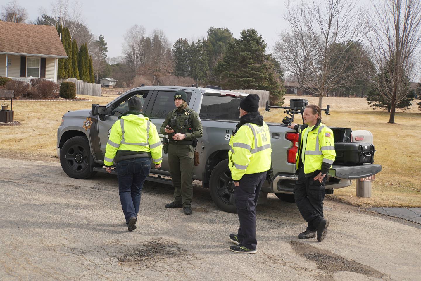 The Ogle County Sheriff's Office and other area organizations are shown on scene in Davis Junction on Wednesday during a search for a missing woman.