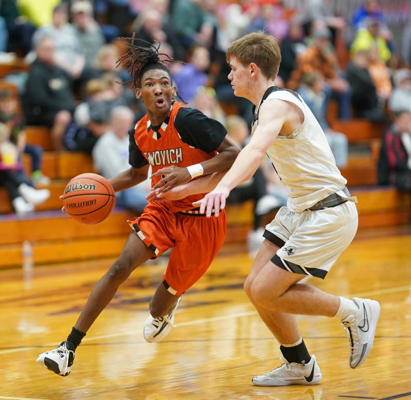 Photos Kaneland vs. Sandwich boys basketball in the 60th Plano