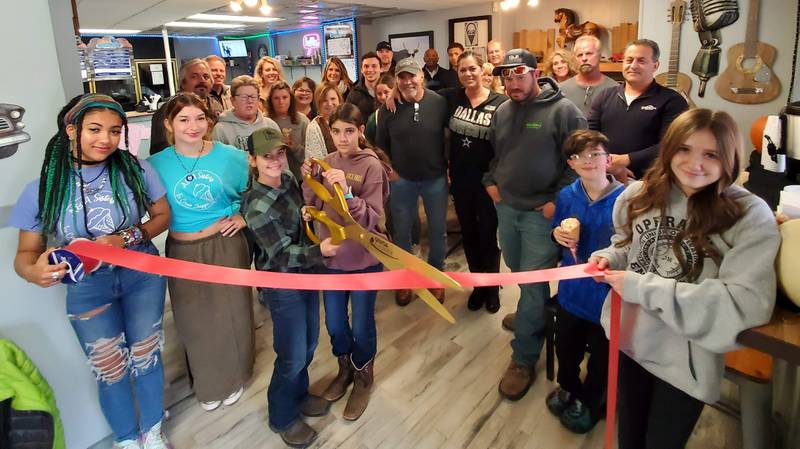 The Genoa Area Chamber of Commerce welcoming A&A Sisters Ice Cream Shoppe with a ribbon cutting