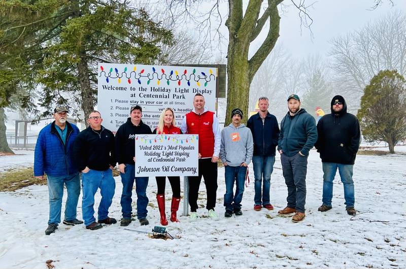 Johnson Oil Co. was selected as the most popular display from the Holiday Lights Display that was held Dec. 2 to Dec. 25 at Centennial Park in Rock Falls. Members of the display team, from left, Erv Cornstubble, Fred Reedy, Quentin Zittle, Julie Wing, Geoff Wing, Josh Zink, Jason Schuetz, Jordan Long, and Brad Jackson.