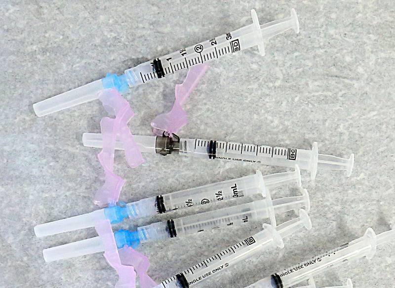 Needles containing the Moderna COVID-19 Vaccine wait for recipients at the Putnam County EMA building in Hennepin on Wednesday Jan. 20.