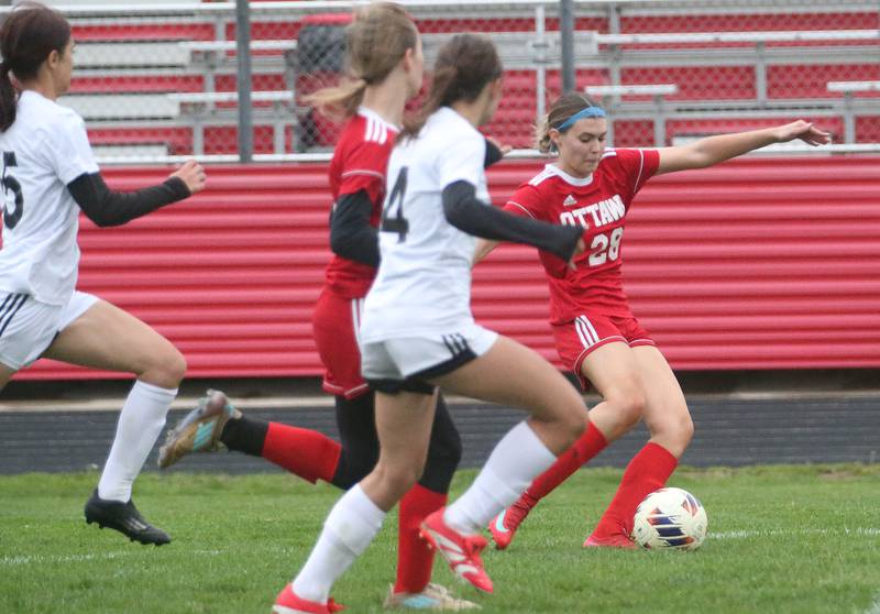 Ottawa's Ayla Covalsky keeps the ball away from L-P defenders on Wednesday, April 30, 2025 at King Field in Ottawa.