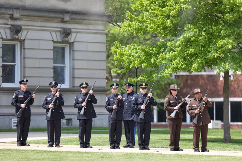 The Kankakee Area Honor Guard performs a 21 gun salute during the annual Law Enforcement Officers Memorial Ceremony honoring Kankakee County officers, held on the lawn of the Kankakee County Courthouse on Thursday, May 15, 2025.