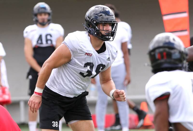 Northern Illinois Huskies linebacker Nick Rattin runs through a drill Tuesday, Aug. 9, 2022, during practice in Huskie Stadium at NIU.