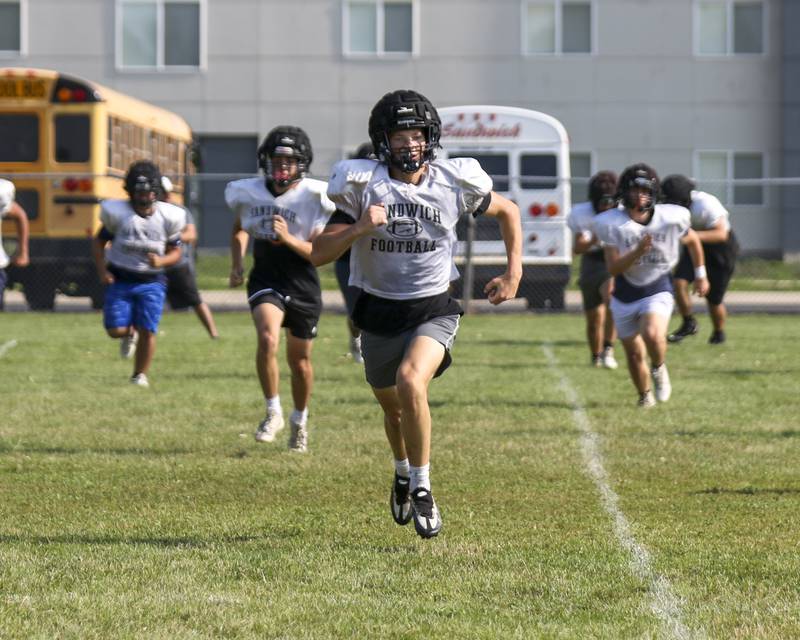 Wyatt Gregory leads the pack during running drills at Sandwich football practice Tuesday, July 22, 2025 in Sandwich.