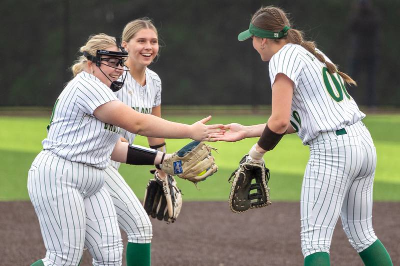 Macy Strauch (left), Macy Kelly and Jill Pinter of St. Bede celebrate on Tuesday, May 27, 2025 at Illinois Valley Central High School in Chillicothe.