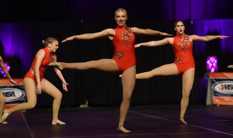 Joe Lewnard/jlewnard@dailyherald.com
Joliet Catholic Academy performs during the Class 2A Competitive Dance finals at Grossinger Motors Arena in Bloomington Saturday.