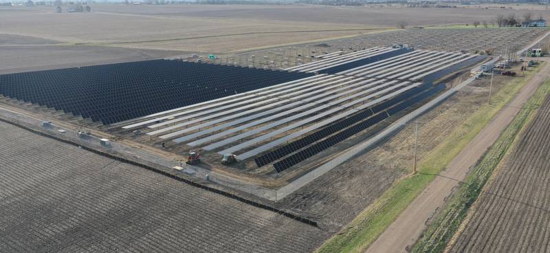 Crews build solar panels for Saliva Solar LLC near the intersection of County Road 1800 North and County Road 2100 East Street on Monday, March 30, 2026 north of Princeton. The solar farm will be a 5-megawatt commercial solar energy facility on 30 acres. When completed, it will provide enough electricity to power 1,100 homes.
