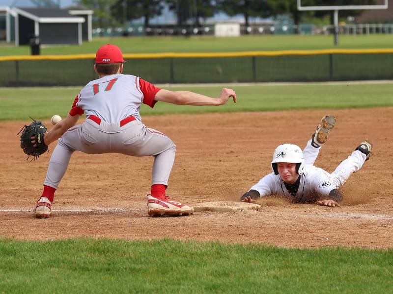 Kaneland's Caleb Cornell slides safely into third as La Salle-Peru’s Gavin Stokes takes the throw Tuesday, May 12, 2026, during their game at Kaneland High School in Maple Park.