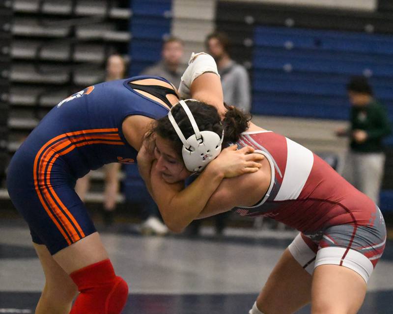 Averia Colella, right, of Lockport wrestles Daniela Santander of Romeoville during the 105-weight clas championship on Saturday Jan. 4, 2025, in the championship match up where Averi won in a 9-1 decision during the Aaron Dundley invite held at Oswego East High School.
