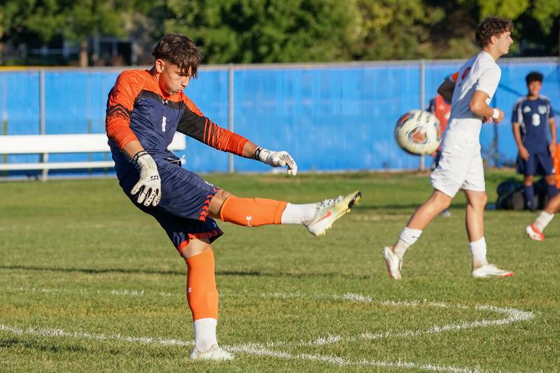 Oswego’s Cristian Lopez (1) plays the ball off a goal kick against Oswego East during a Southwest Prairie Conference game at Oswego East High School on Thursday, Sept. 25, 2025.