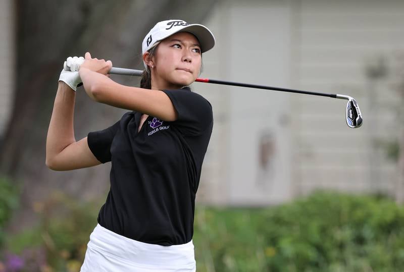 Hampshire’s Kaylee Seo tees off on the par three seventh hole Thursday, Sept. 28, 2023, during the Class 2A girls golf regional at Sycamore Golf Club in Sycamore.