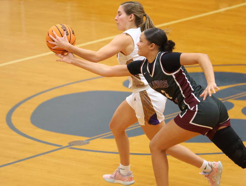 Mendota's Jocelynn Figueroa, grabs the ball in front of Illinois Valley Central's Alayah Nelton during the Tiger Girls Basketball Holiday Tournament on Tuesday, Nov. 18, 2025 at Princeton High School.