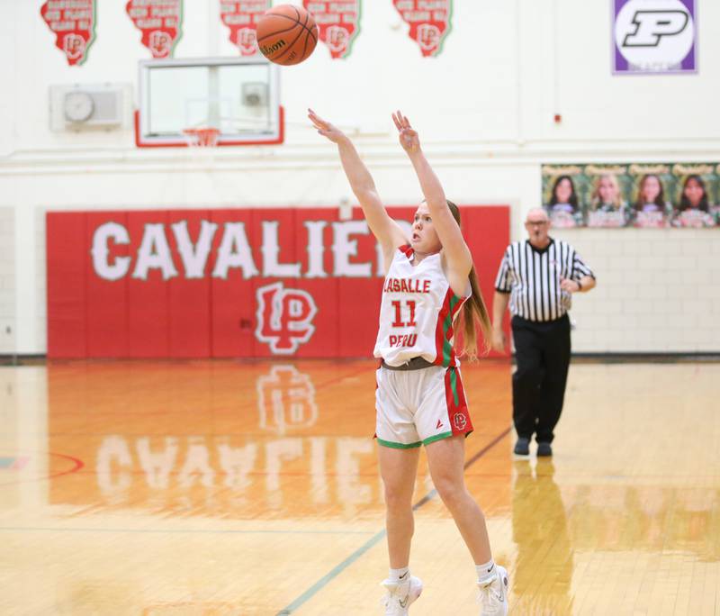 L-P's Elizabeth Sines shoots a wide-open jump shot on Friday, Dec. 8, 2023 in Sellett Gymnasium at L-P High School.