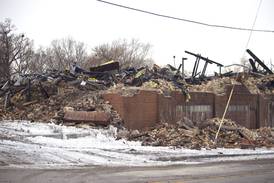 PHOTOS: Joliet building demolished after fire