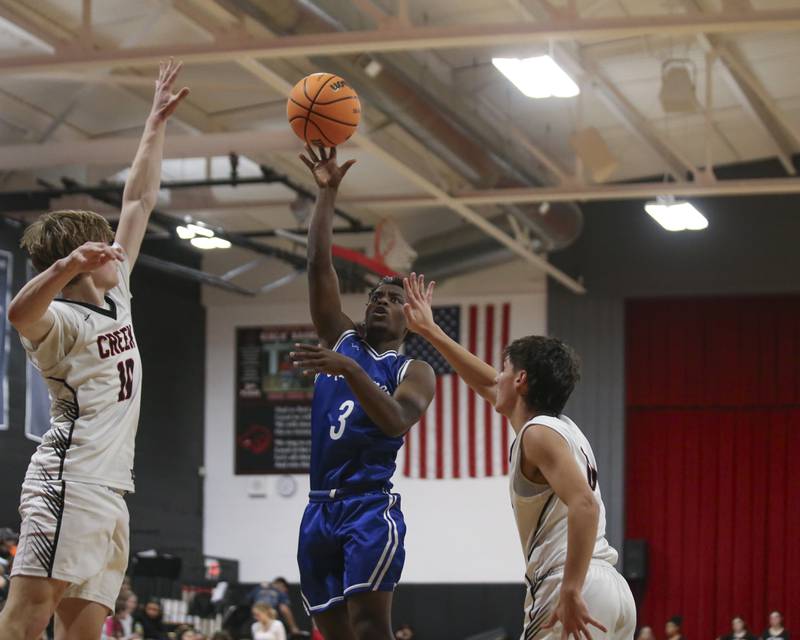 Newark's Reggie Chapman (3) goes up with a short, one-handed shot against Indian Creek on Tuesday, Jan. 13, 2026, in Shabbona.