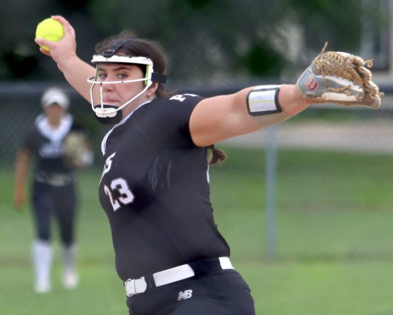 Prairie Ridge’s Reese Mosolino fires toward home against Harvard during Class 3A softball regional final action at Lions Park in Harvard Friday.