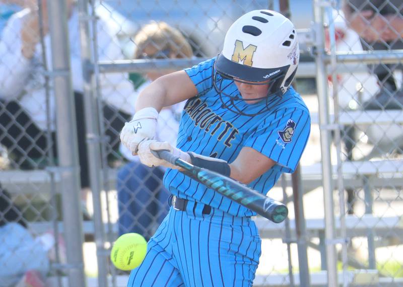Marquette's Hunter Hopkins makes contact with the ball on Tuesday, April 23, 2026 at June Cross Field in Ottawa.