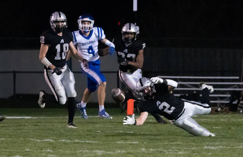 Kaneland's Johnny Spallasso (2) dives for a blocked kick by Kaneland's Dawson Trebolo (not pictured) against Riverside Brookfield during a 6A playoff football game at Kaneland High School in Maple Park on Friday, Oct 28, 2022.