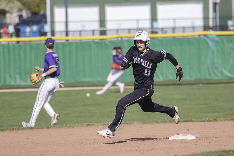 Rock Falls’ Gavin Sands rounds second against Dixon on Tuesday, April 18, 2023.