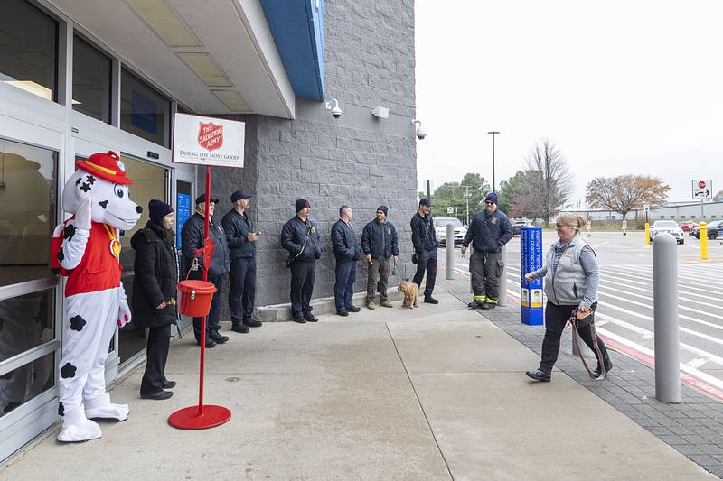 The Sterling Fire Department mans the west entrance of Walmart Thursday, Nov. 20, 2025, for donations to the Salvation Army. The police and fire departments went head to head in donation collections to help benefit the Salvation Army.