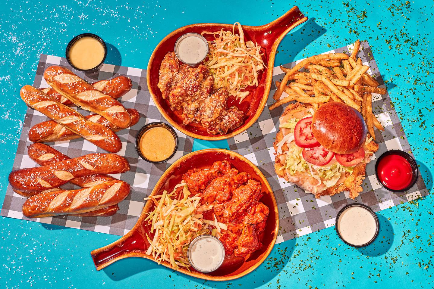Woodie’s Wings is a quick service spin-off of Woodie’s Flat in Chicago that sells wings, beef fat fries, chicken sandwiches, pretzels, milkshakes and other items.