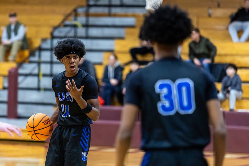 Lincoln-Way East's Jaymon Hornsby calls out a play during a varsity basketball game against Lockport at Lockport Township High School East Campus on Jan. 23, 2026.