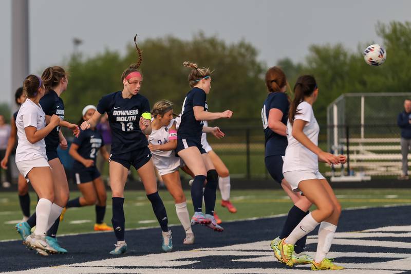 Downers Grove North's Ellie Watts (24) heads the ball in for a goal during Class 3A Addison Trail Regional final soccer match between Downers Grove South at Downers Grove North.  May 19, 2023.
