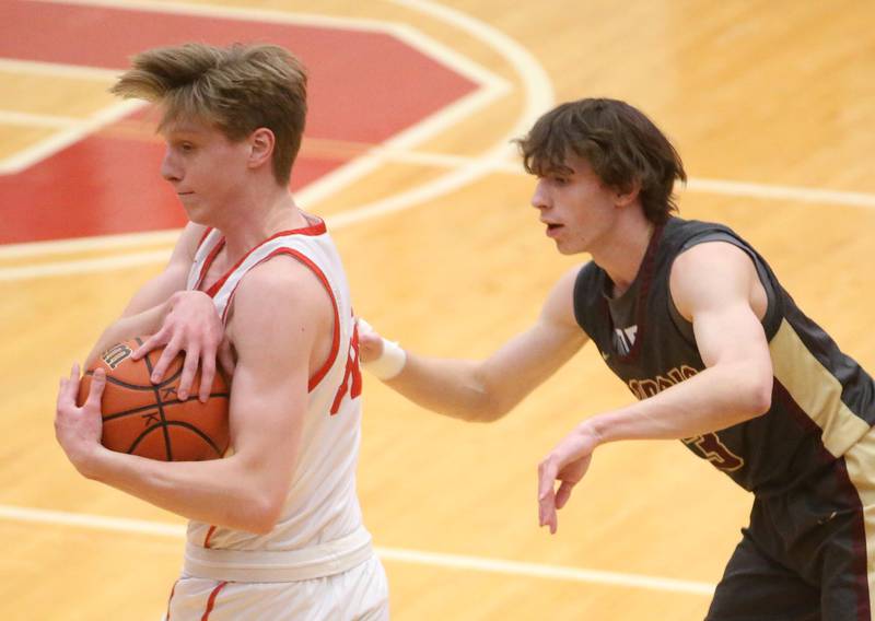 Ottawa's Aric Threadgill steals the ball away from Morris's Caston Norris on Wednesday, Jan. 3, 2024 at Kingman Gym.