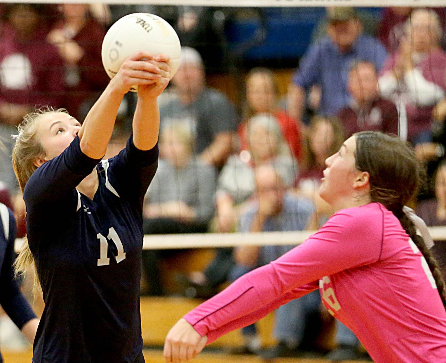 Fieldcrest's Allie Wiesenhofer saves the ball from going out of bounce as teammate Carolyn Megrow backs her up in the Class 2A Sectional volleyball final at Prairie Central High School on Wednesday, Nov. 2, 2022 in Fairbury.