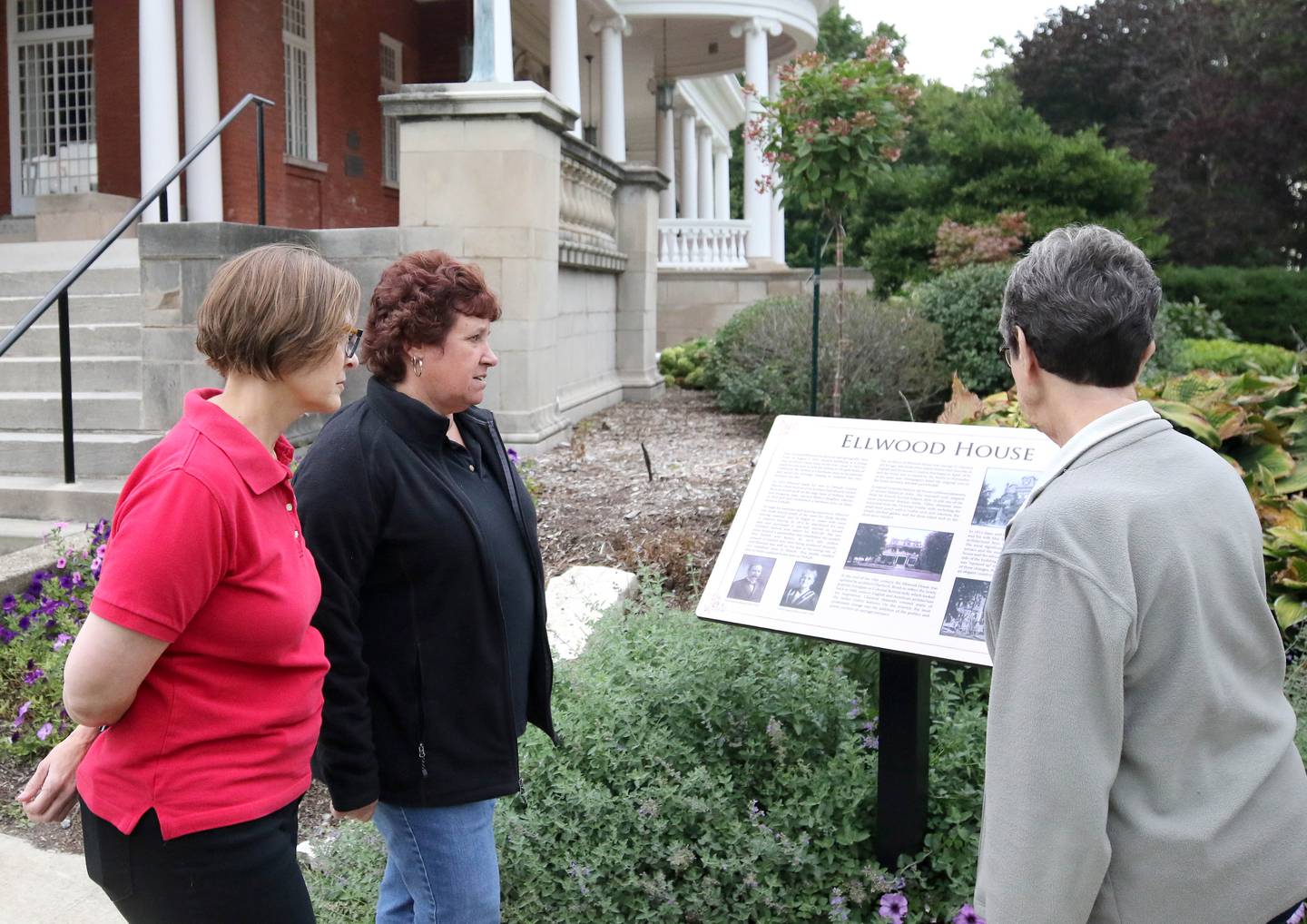 Sherrill Morris (left) from DeKalb and Diane Handlen, get a tour the grounds of the Elwood House in DeKalb from volunteer docent Nancy Leonard (right) Friday, Sept. 23, 2022, during Handlen's visit to the area from the state of Maine. Morris and Handlen have been pen pals since the 1970's and recently met each other in person for the first time.