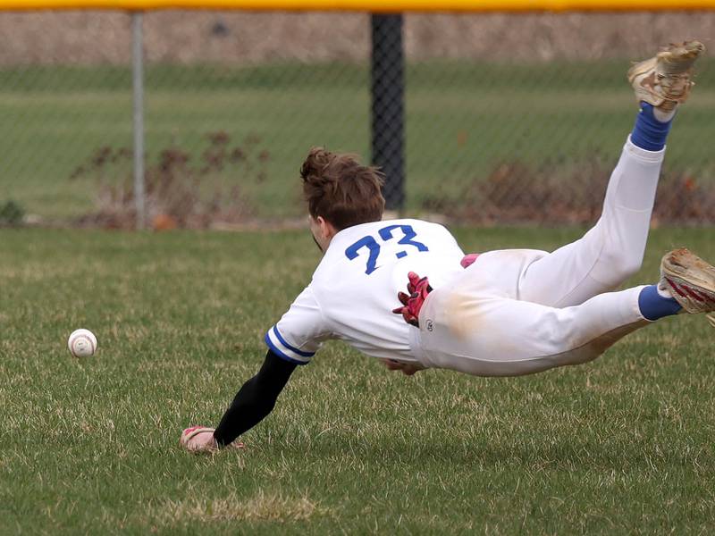 Hinckley-Big Rock’s Skyler Janeski makes a diving attempt to make the catch during their game against Polo Thursday, April 3, 2025, at Hinckley-Big Rock High School.