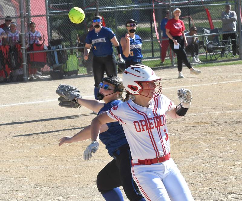 Oregon's Avery Young beats the throw to Somonauk first baseman Kammy Ambler at the 2A Oregon Regional on Wednesday, May 20, 2026.