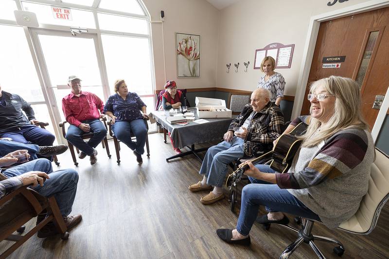 Kathy Cecchetti sings Happy Birthday to Bob Chamberlin Friday, March 21, 2025, at Liberty Court in Dixon. Chamberlin is celebrating 101 years.