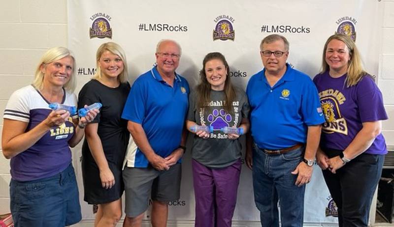 Pictured (L to R): Kristi Ljunggren, Ashley Funk and Doug Lomen, Tanya Reddig, Randy Funk and Angie Compere.