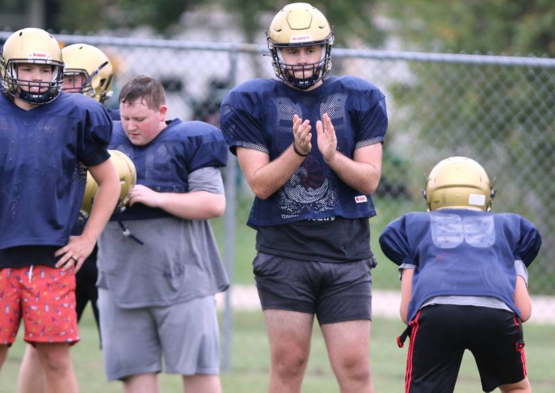 Hiawatha’s Zach Edwards encourages a teammate during practice Wednesday, August 9, 2023, at the school in Kirkland.