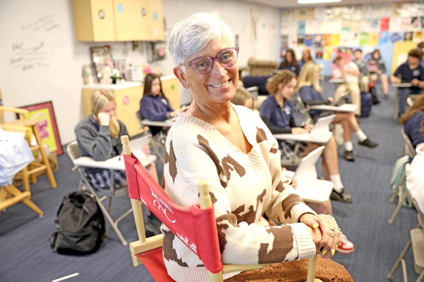 Nazareth Academy’s Kim White teaches a speech class at the La Grange Park school. White has also taught drama at the school for over 30 years.