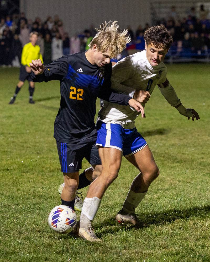 Brady Andrews (22) of Somonauk/Leland/Newark and Sawyer Smith (0) of Hinckley-Big Rock fight over possession of ball during the Little Ten Conference Championship match on Thursday, Oct. 9, 2025 at Hinckley-Big Rock School in Hinckley.