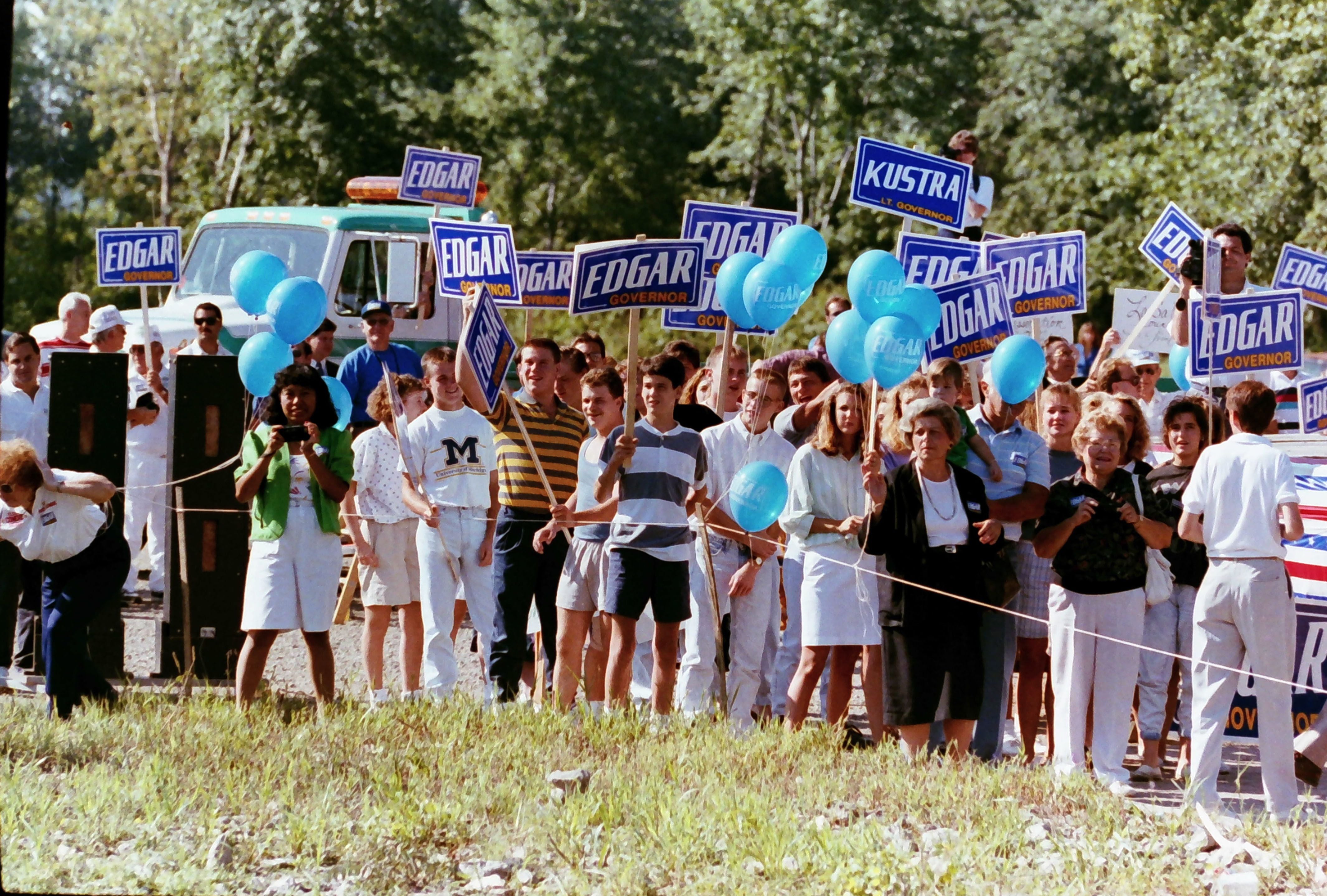 Jim Edgar supporters hold signs during his candidate rally for Governor of Illinois on Thursday, Aug. 30, 1990 in Peru.