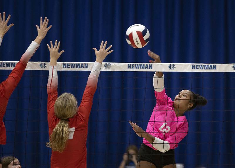 Newman’s Gisselle Martin hammers a shot against Oregon Thursday, Sept. 11, 2025.