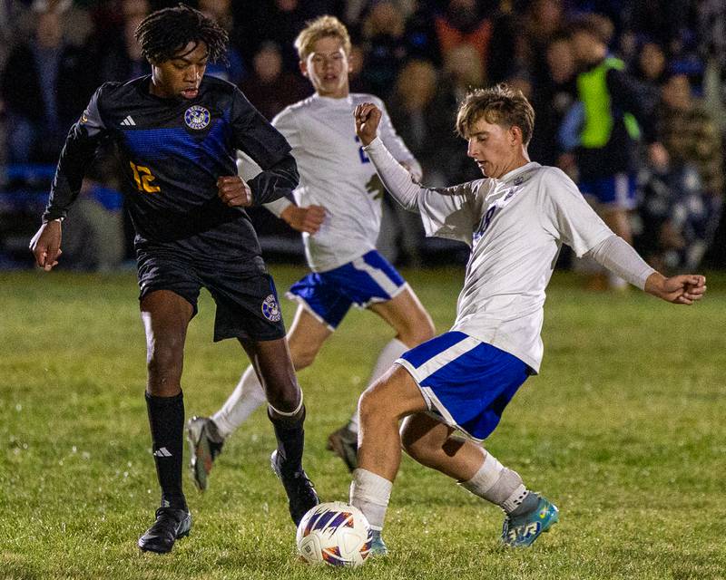 Jackson Brockway (12) of Somonauk/Leland/Newark and Colton Sargent (18) of Hinckley-Big Rock fight over possession of ball during the Little Ten Conference Championship match on Thursday, Oct. 9, 2025 at Hinckley-Big Rock School in Hinckley.
