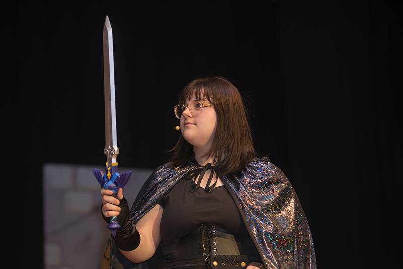 Tilly, played by Karalynn Kirkpatrick, shows off her sword during rehearsal of “She Kills Monsters” Wednesday, May 4, 2022 at Morrison High School.