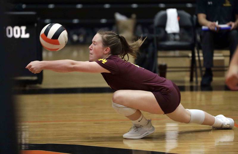 Loyola’s Mary Clare Brady, (4) with a save against the ICCP Knights Saturday September 17, 2022 in Wheaton.