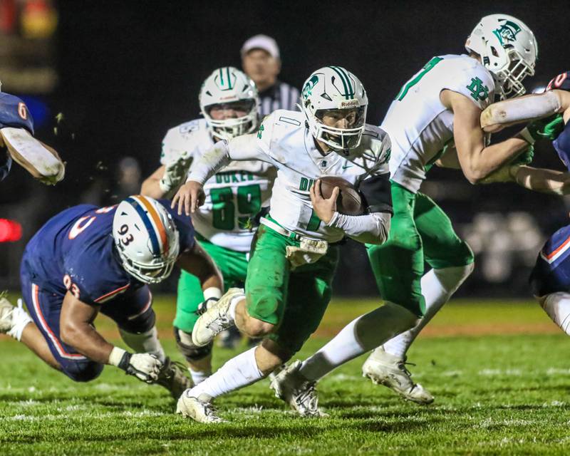 York's Bruno Massel (1) takes off on a designed run during Class 8A second- round football game between York at Oswego on Friday, Nov 8, 2024  in Oswego.