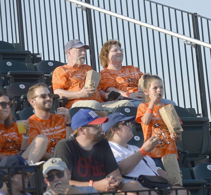 Fans at Schweickert Stadium at Veterans Park enjoy the food and the renovated stands while watching the Illinois Valley Pistol Shrimp's home opener Friday, June 2, 2023, in Peru.