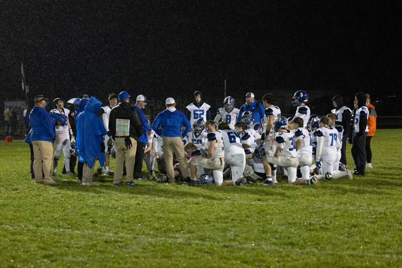 Clifton Central coaches address the team following the Comets' 43-14 loss to Dwight in second round playoffs on Saturday, Nov. 8, 2025.